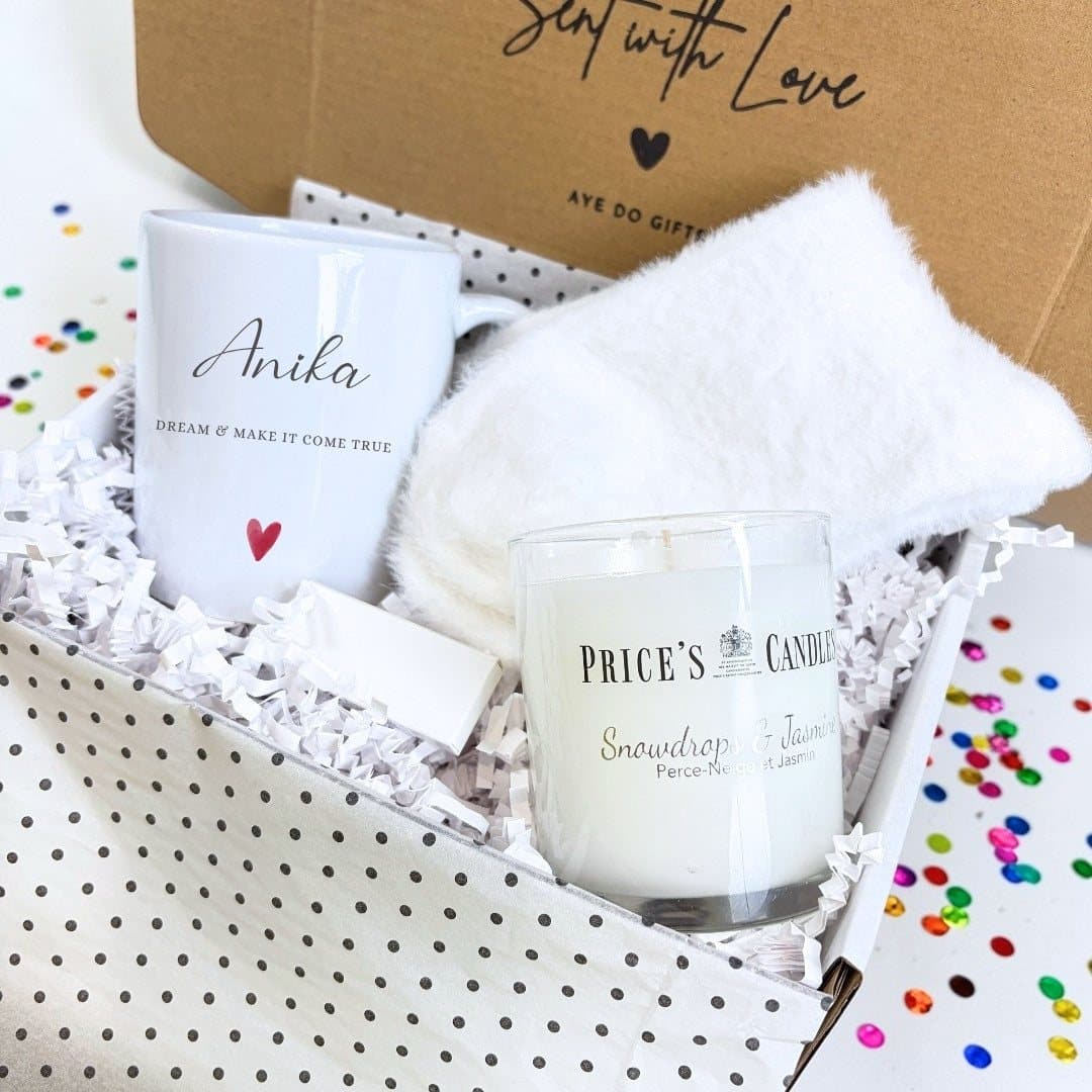 Personalised name mug, scented candle, fluffy socks and matches in a gift hamper