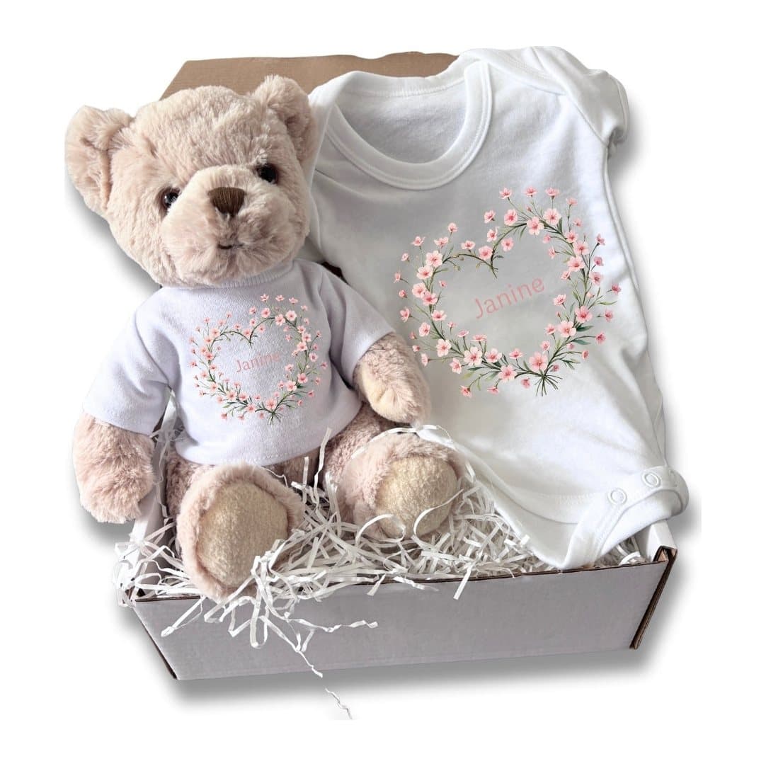 Personalised pink flower heart name baby gift box with a teddy and a baby vest