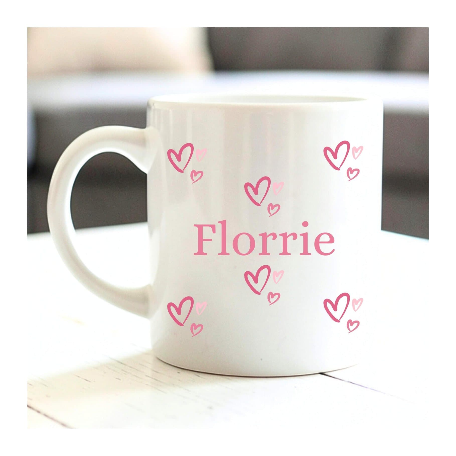 Personalised ceramic mug with a heart design