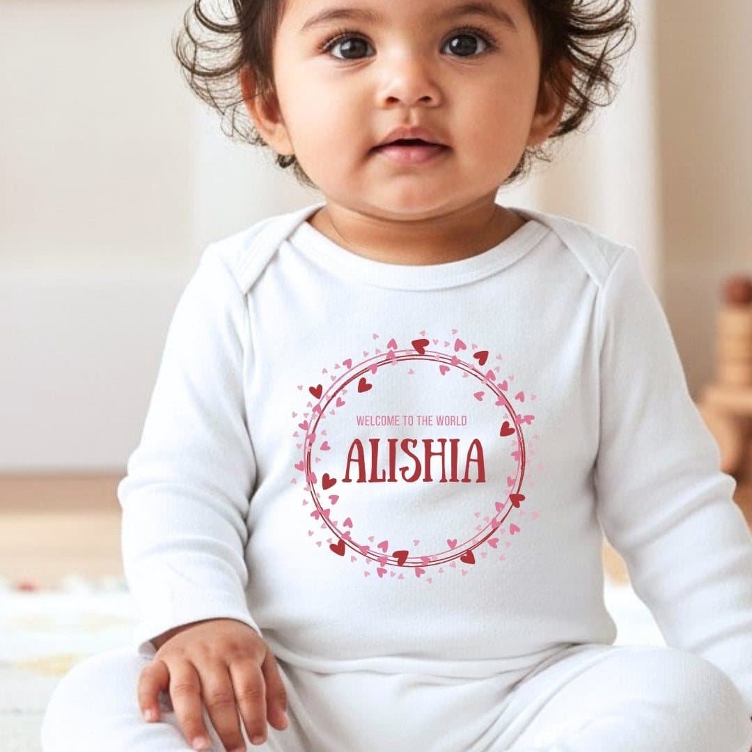 Personalised pink and red hearts baby outfit with a name