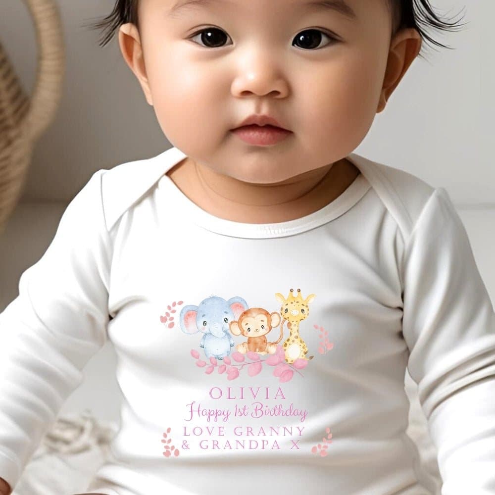 Pink baby grow with a Safari Animals design and a personalised name