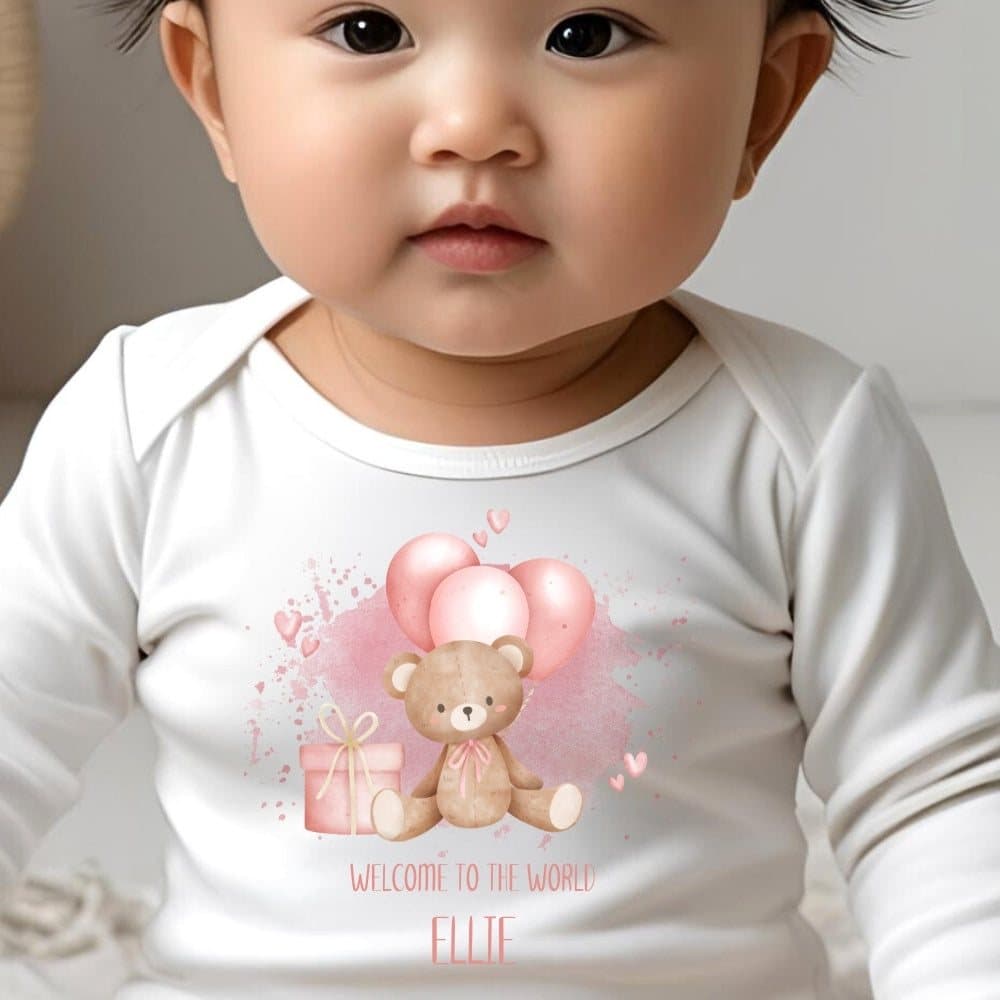 Pink personalised welcome to the world teddy baby outfit with blue balloons