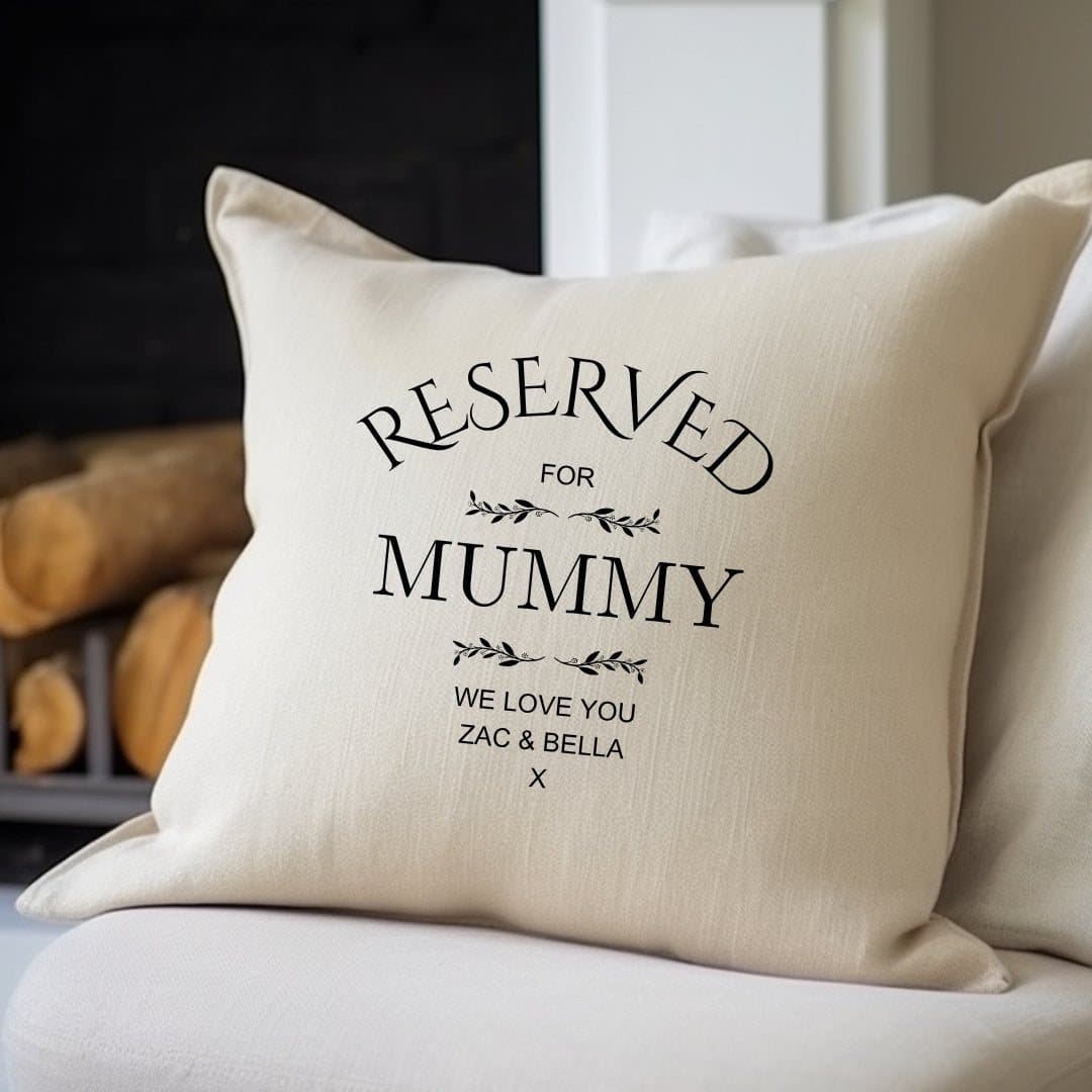 Soft cream cushion with the Reserved for Mummy message