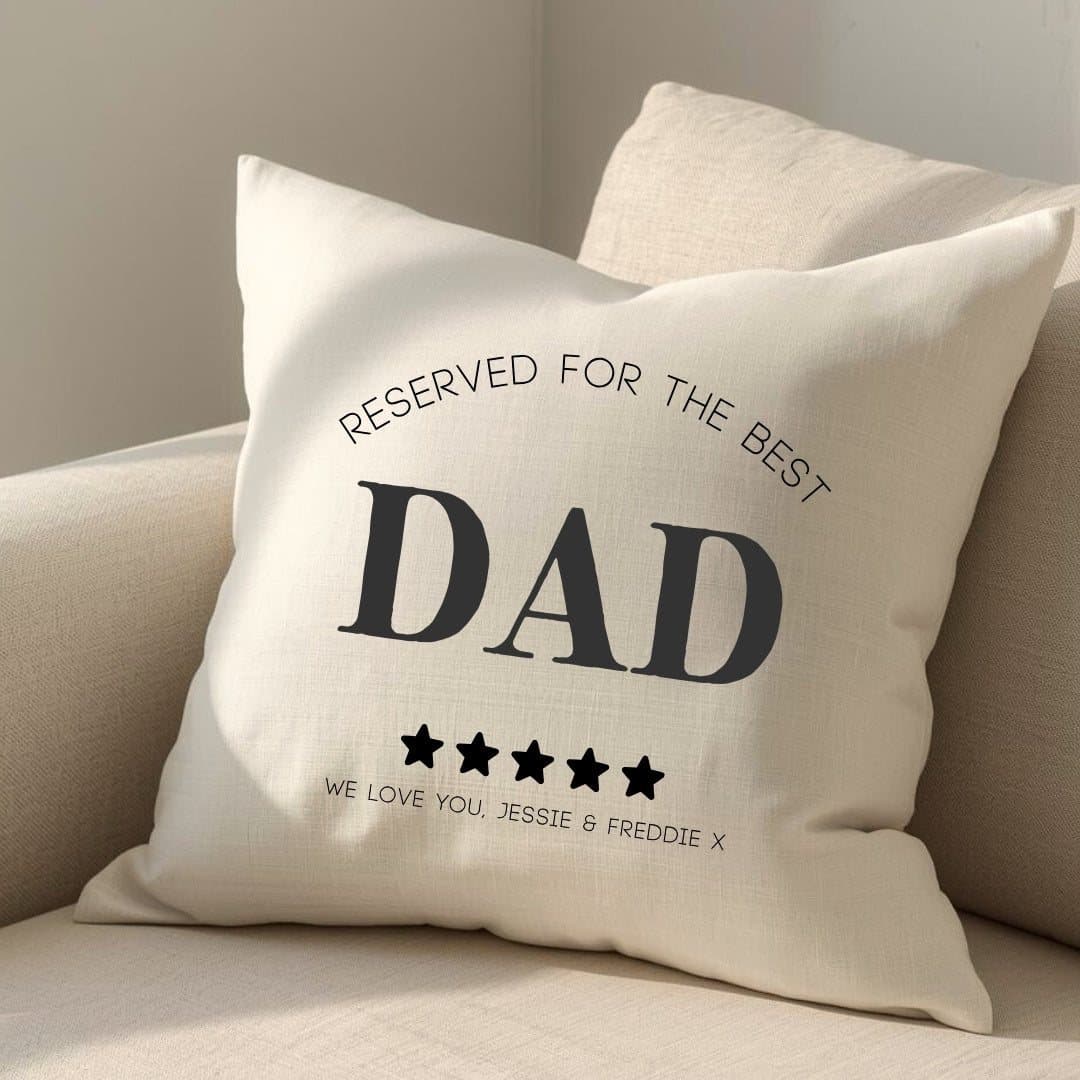 Cream cushion with a black Reserved for the Best Dad message
