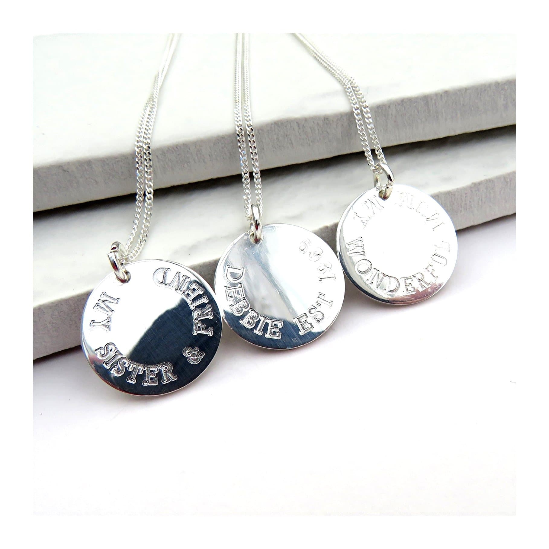 Personalised round charm necklace with a round disc on a sterling silver chain