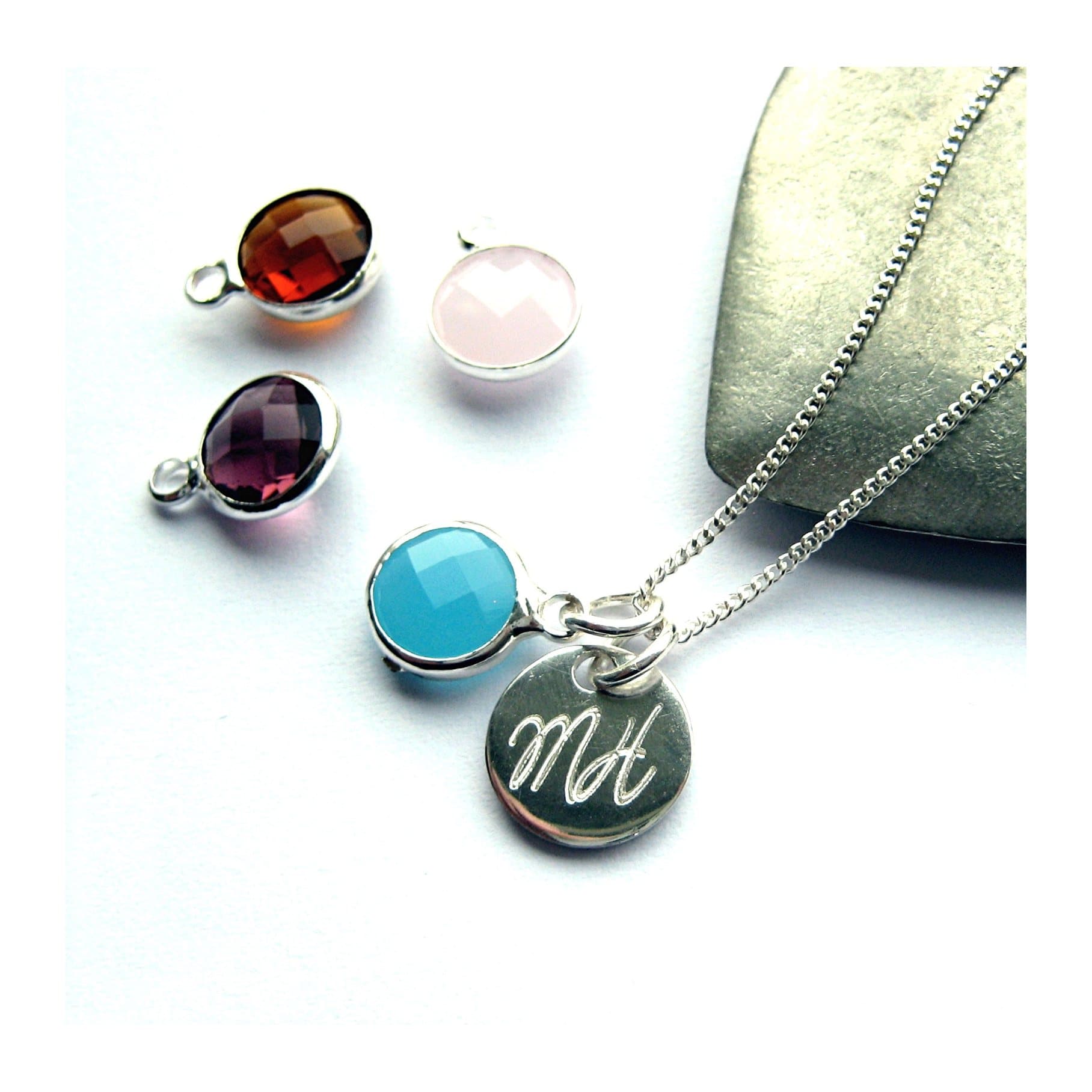 Personalised script necklace with a silver birthstone and engraved disc