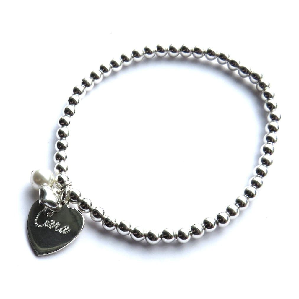 Personalised silver beaded bracelet with sterling silver heart and ivory pearl
