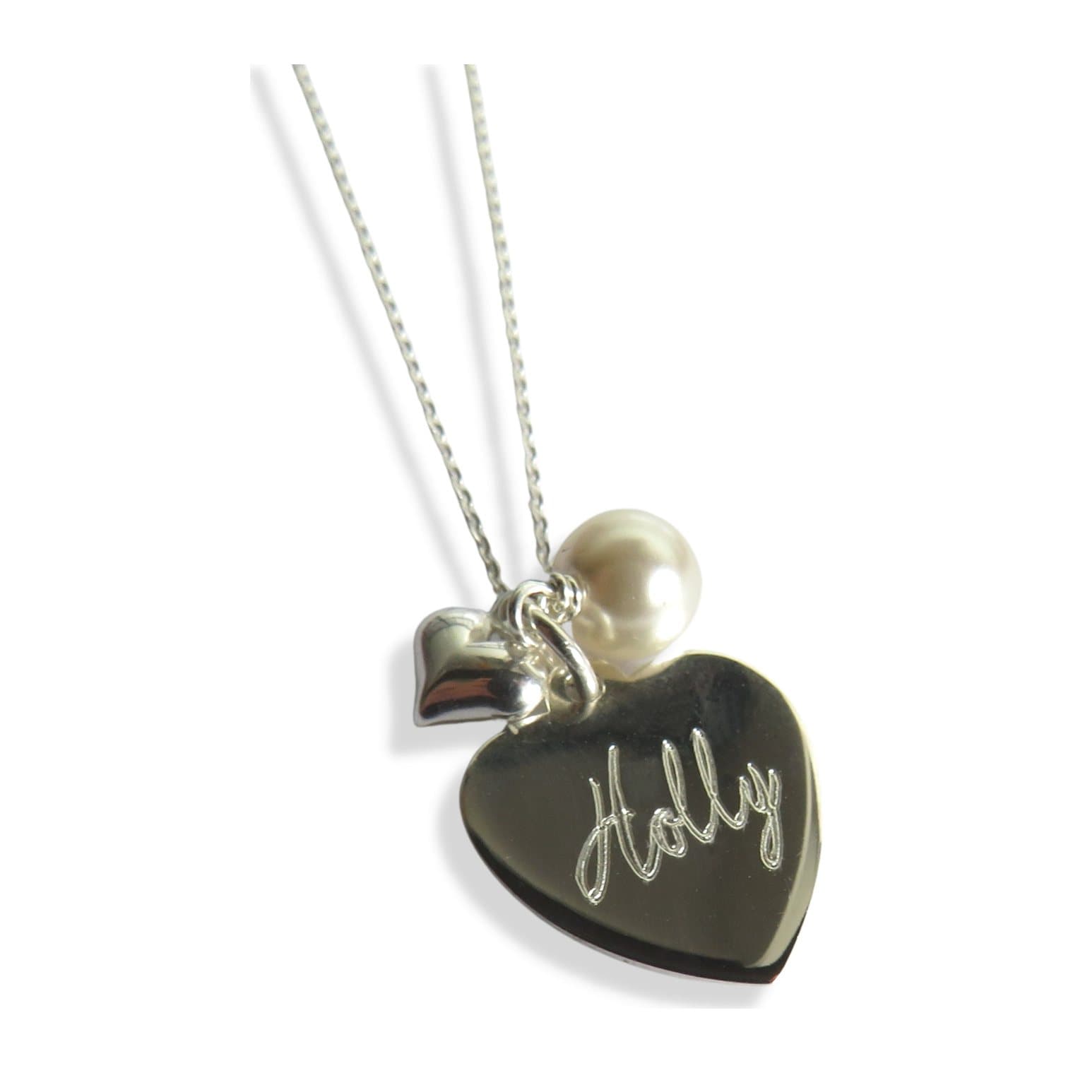 Personalised silver heart necklace with a pearl and mini heart charm on a chain