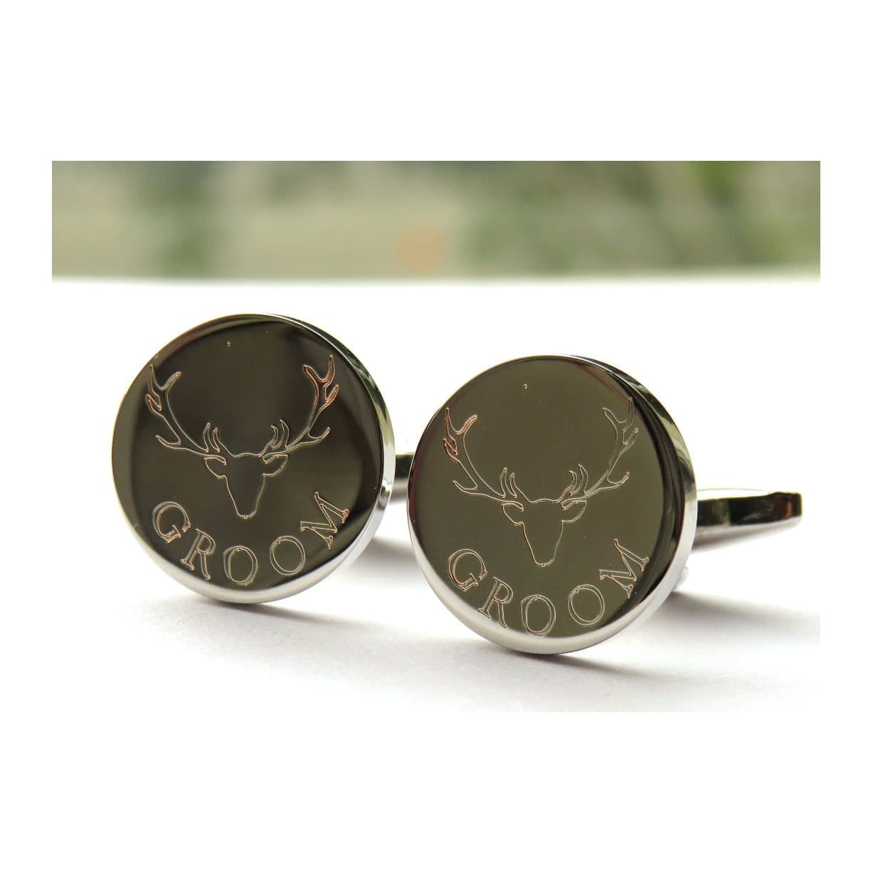 Round personalised cufflinks engraved with a stag's head