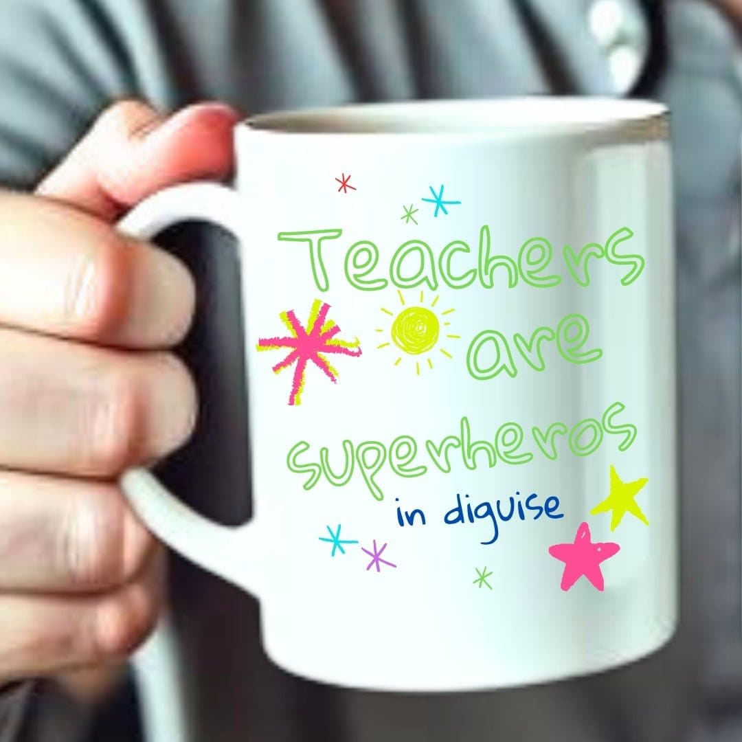 Personalised ceramic teacher mug with a superhero-themed design printed on both sides.