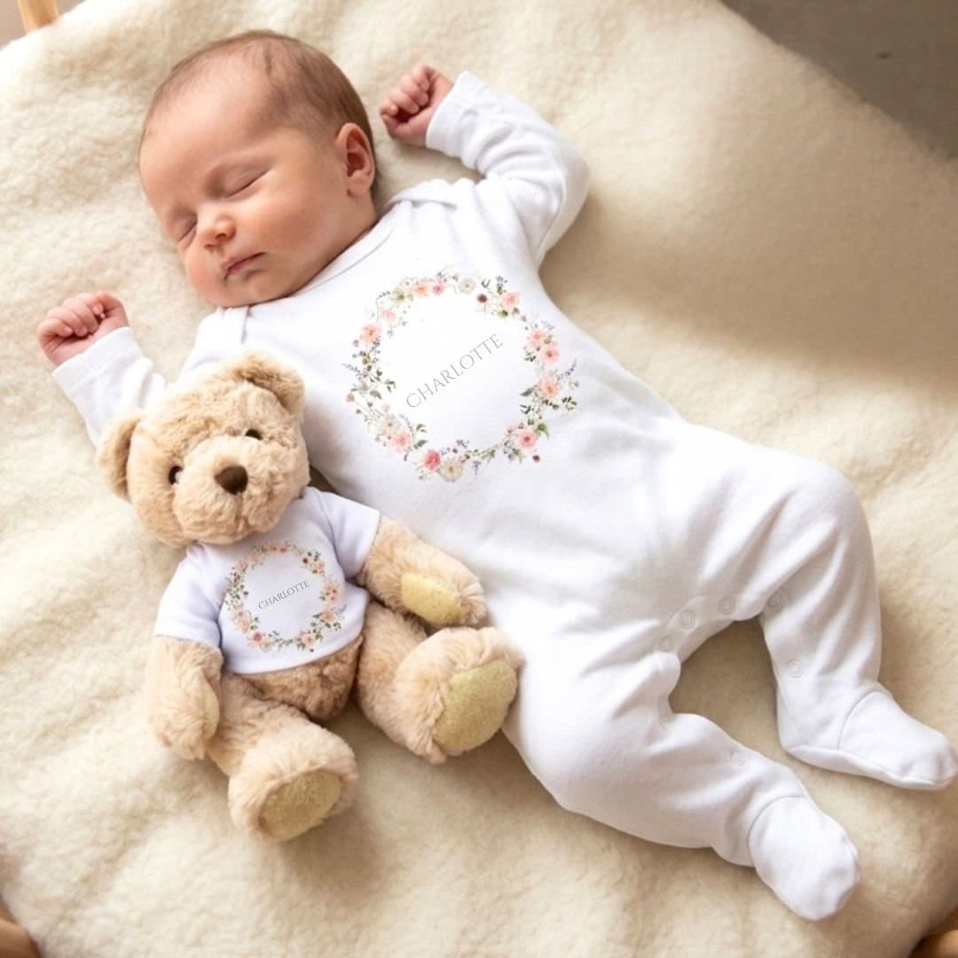 Personalised baby gift box with a wild flower design vest and a teddy bear