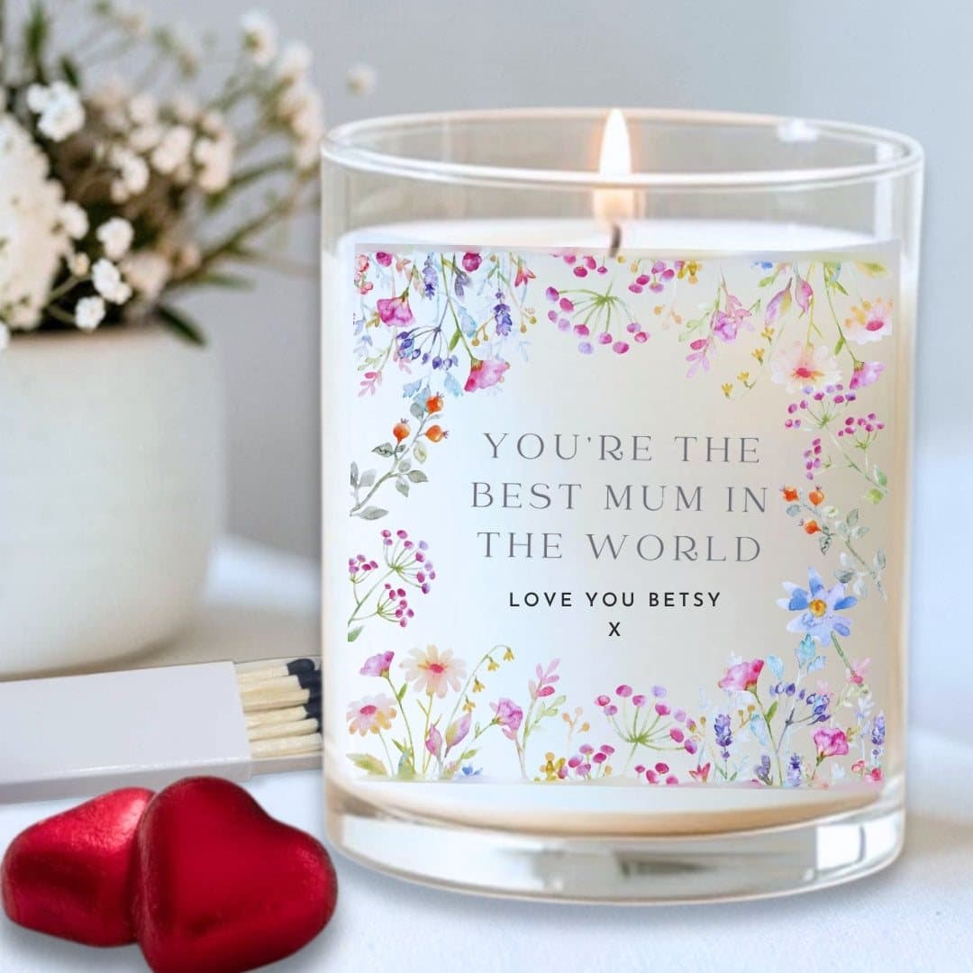 Personalised candle with pastel flower design, chocolate hearts and matches.