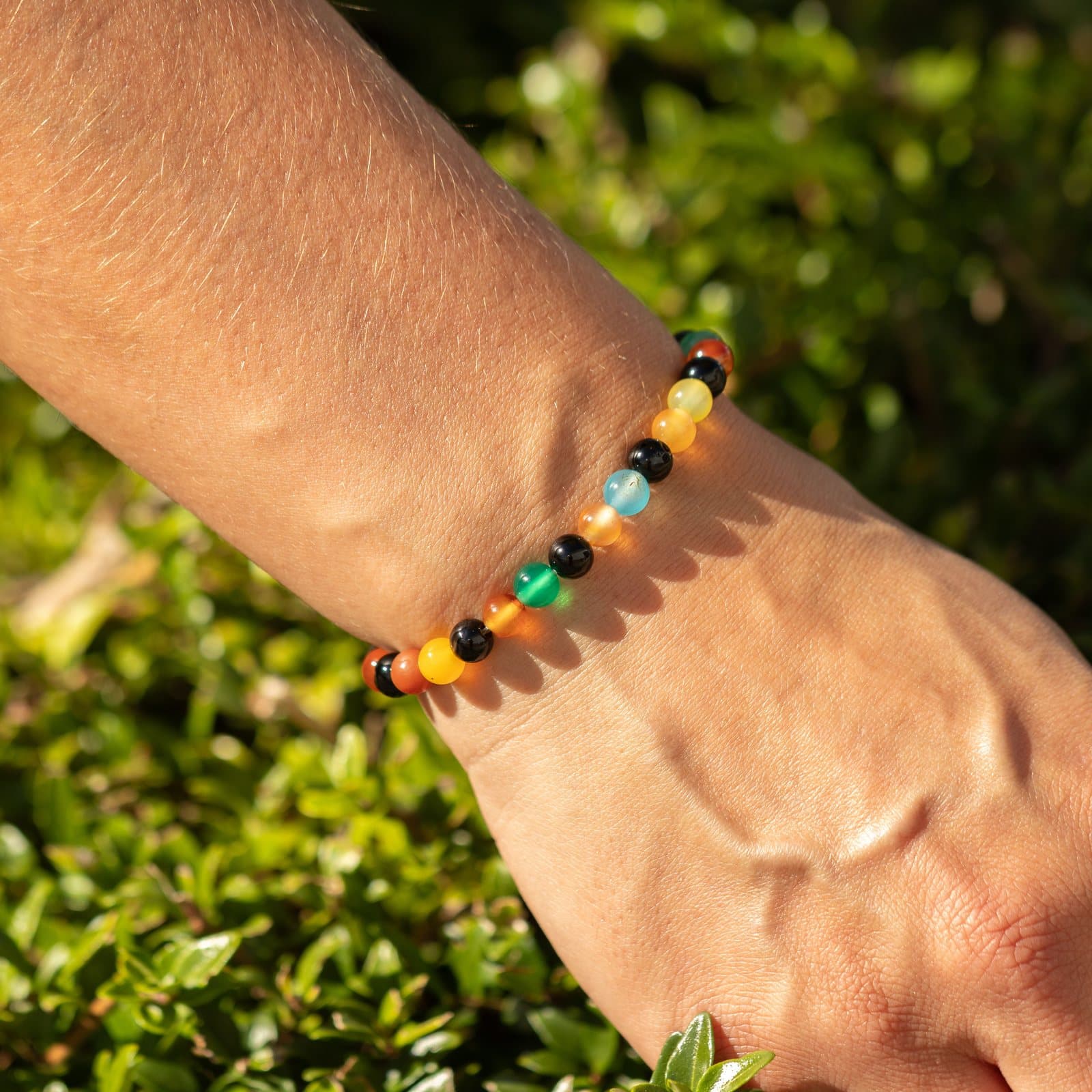 Rainbow jade bead bracelet in red, orange, yellow, green, blue and black
