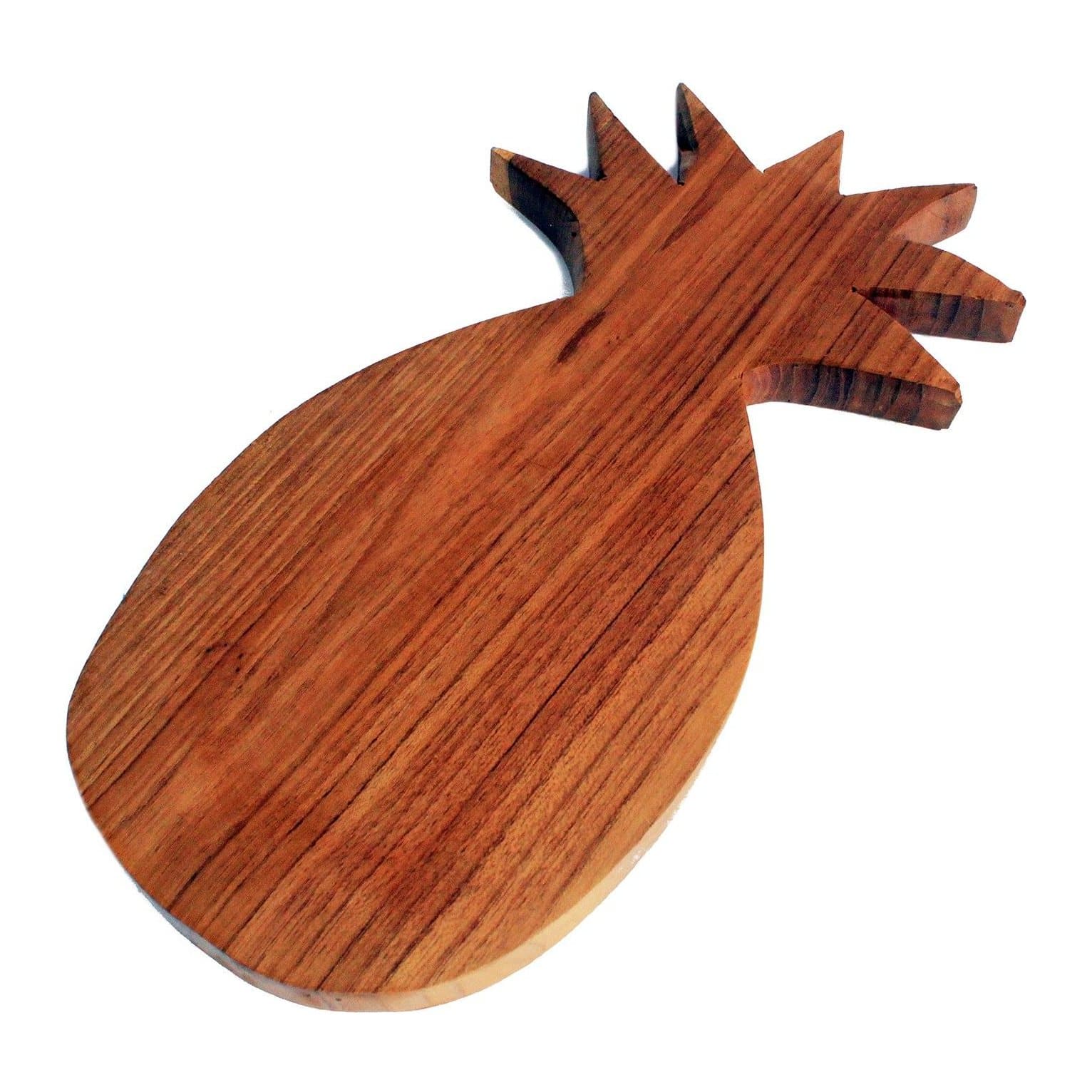 Teak chopping board shaped like a pineapple