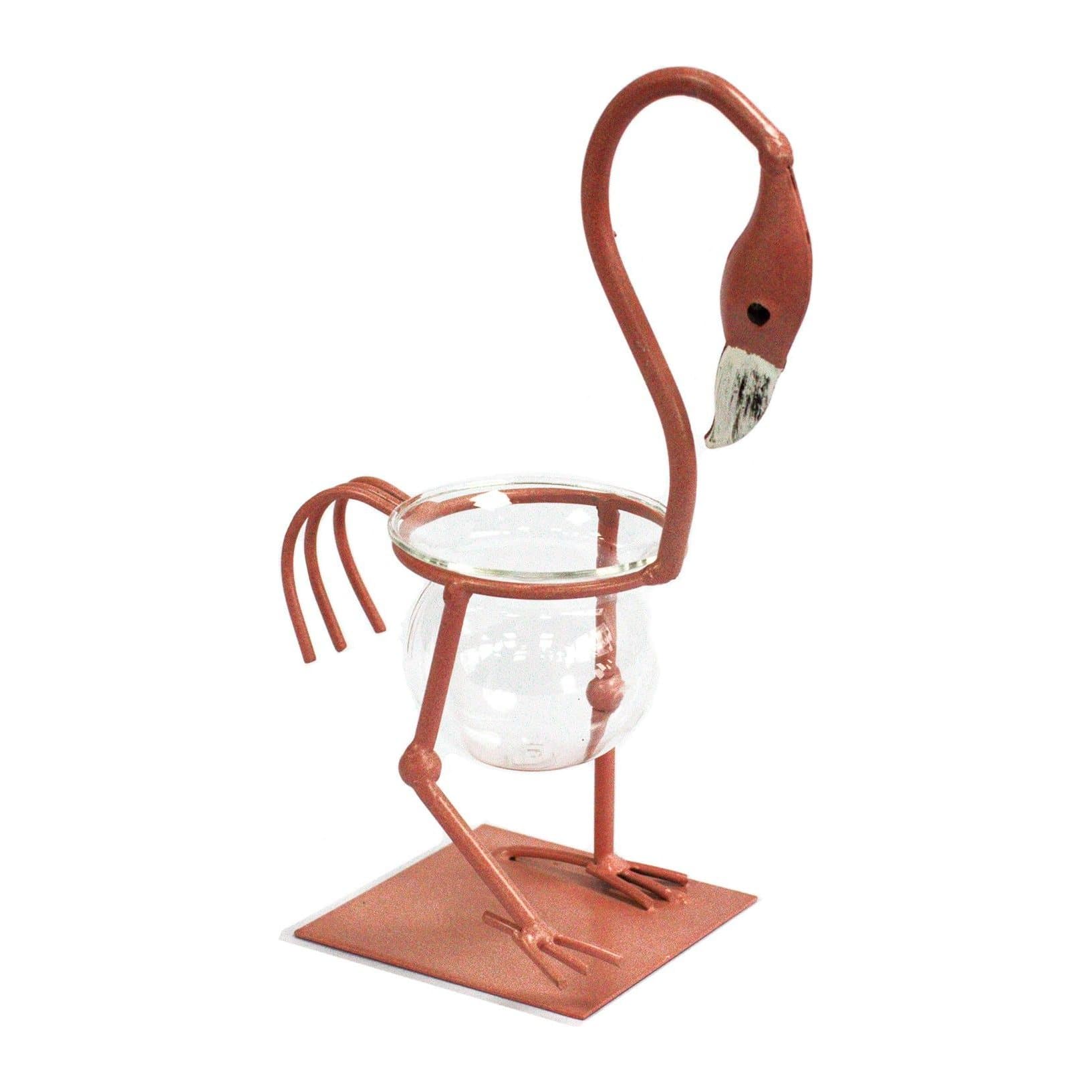Pink metal flamingo hydroponic vase with a laboratory tube in a frame