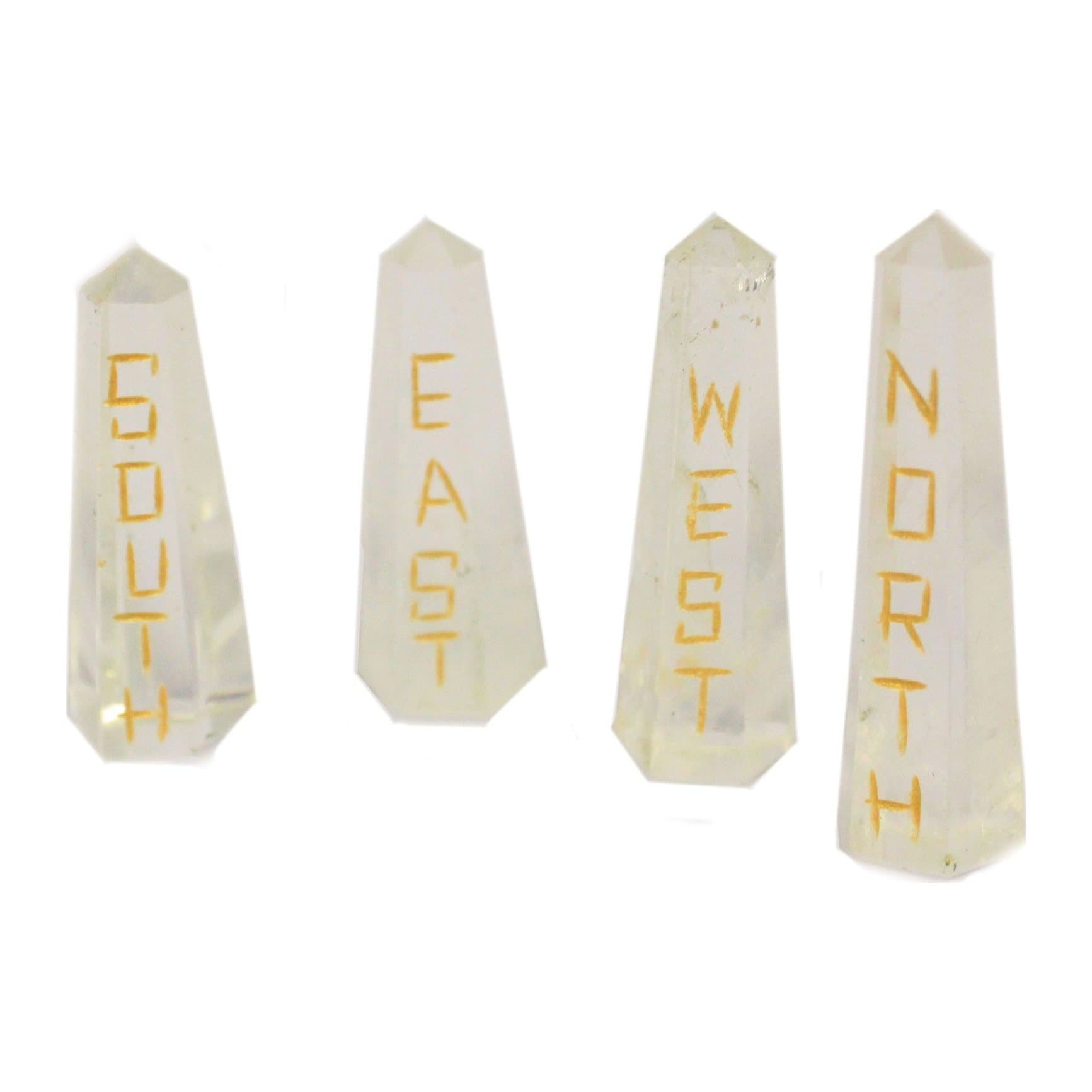 Set of four long quartz crystals engraved with compass directions