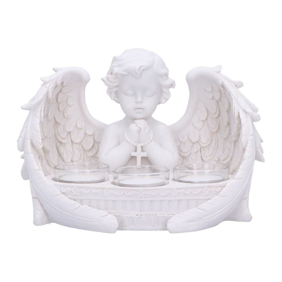 All-white cherub in prayer position with three tea light cups