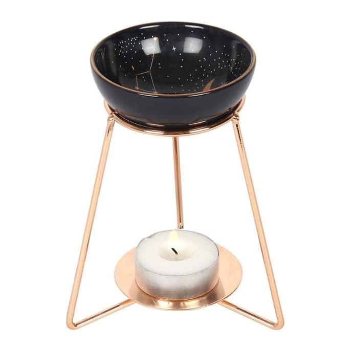 Purple oil burner with a constellation bowl on a gold-coloured stand