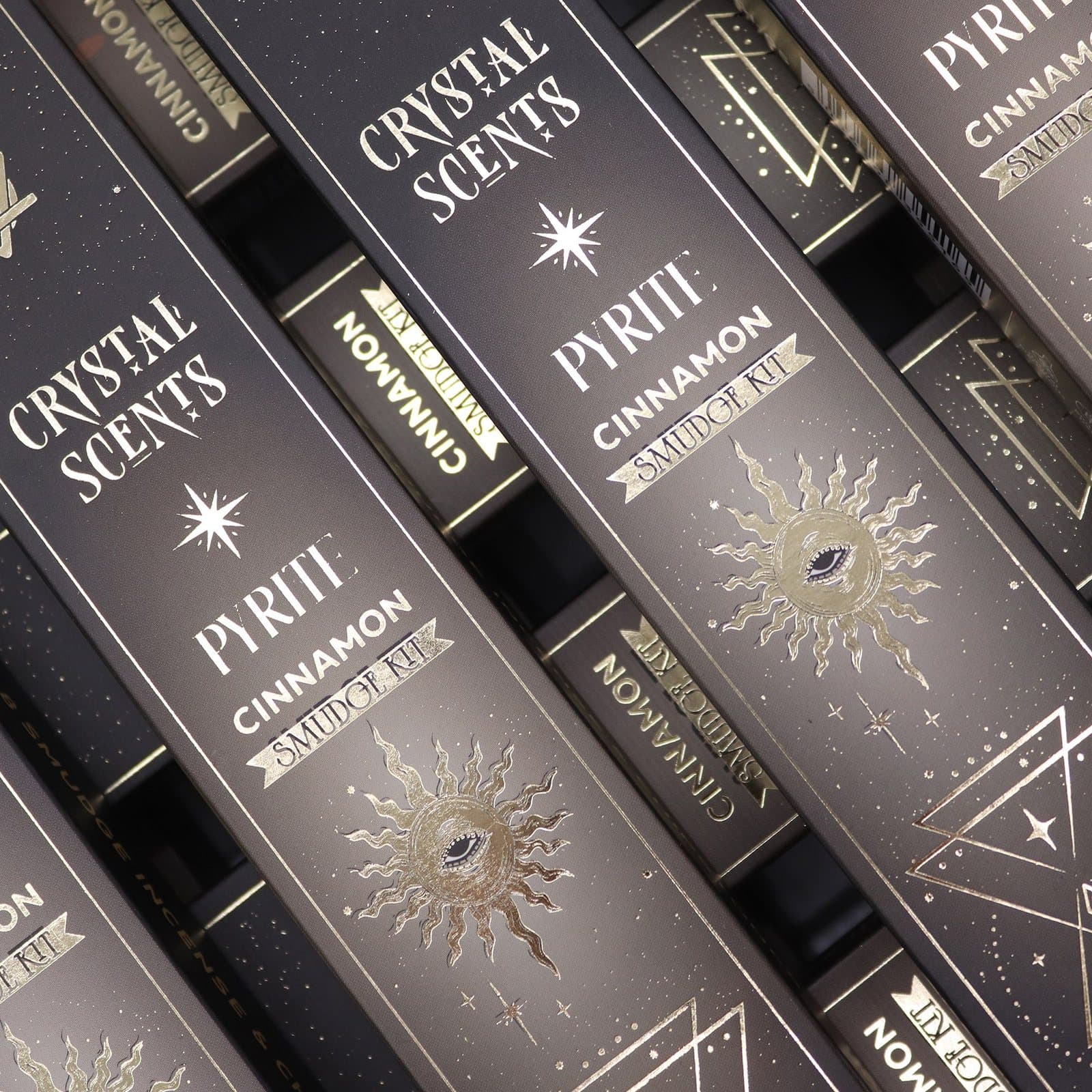 Cinnamon smudge incense sticks in a celestial-themed cardboard sleeve