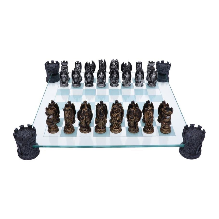 Bronze and silver dragon chess set on a glass checked board with four corner towers