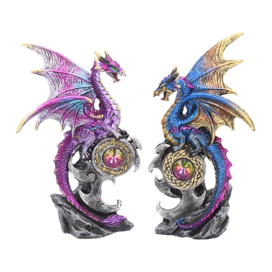 Two blue and purple dragons perched on framed jewels