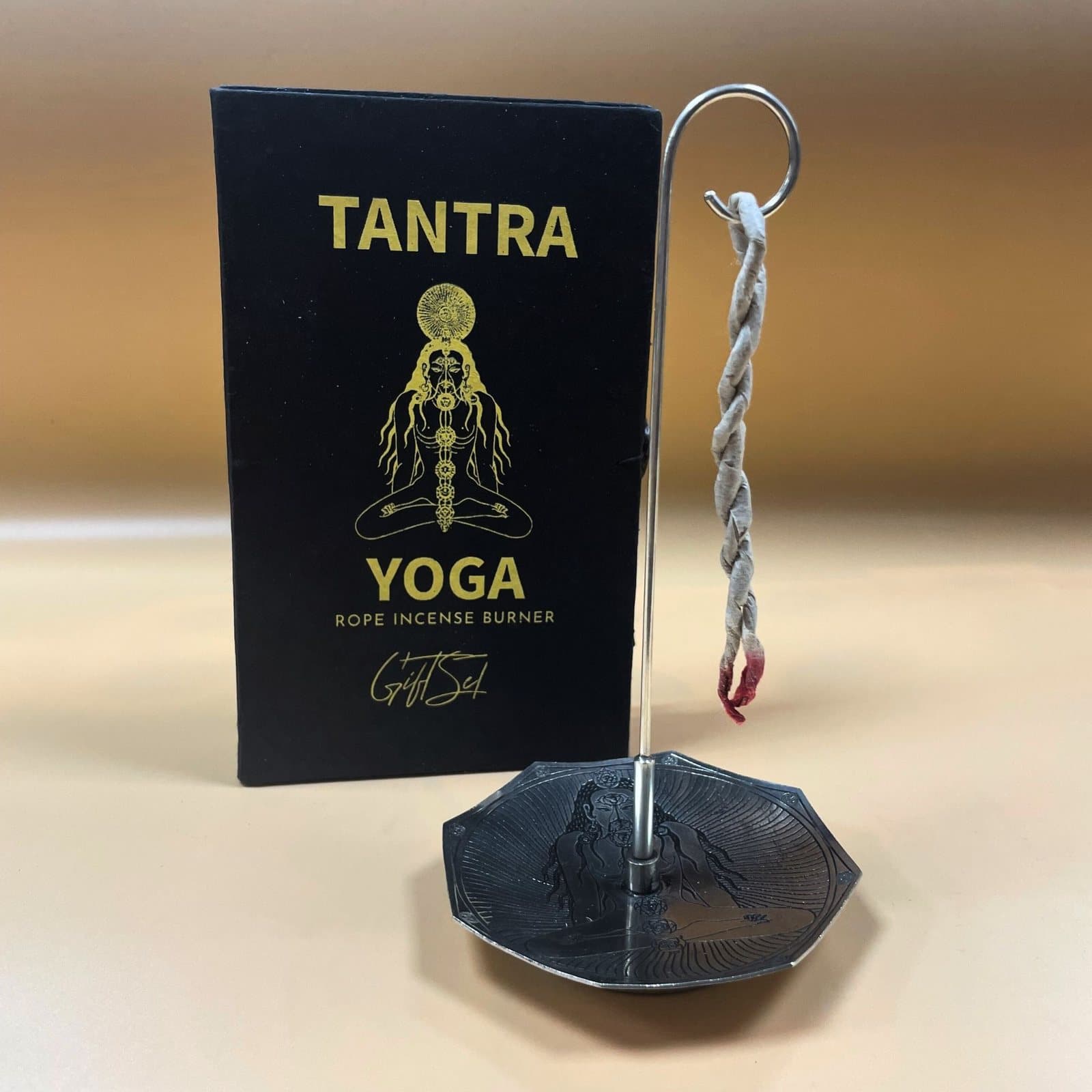 Rope incense set with a silver-plated holder showing the Seven Chakras design
