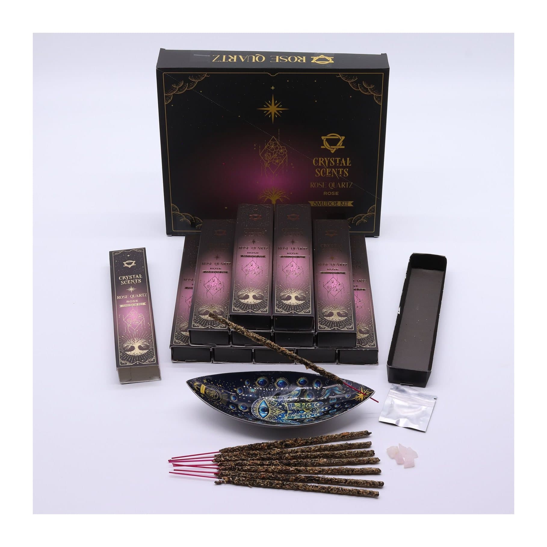 Rose smudge incense sticks in a pink cardboard sleeve, with rose quartz chips