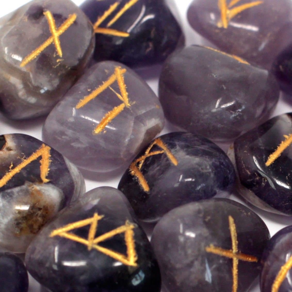 Amethyst rune stones set in a pouch