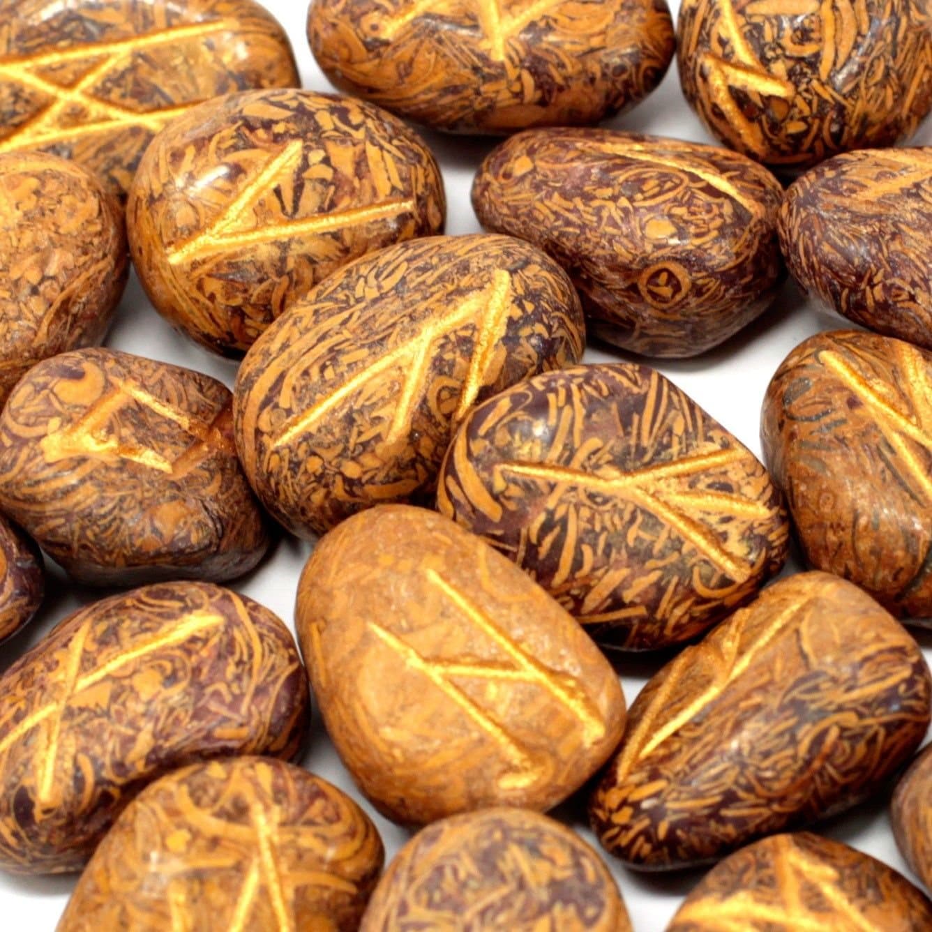 Snake jasper rune stones set in a printed cotton pouch