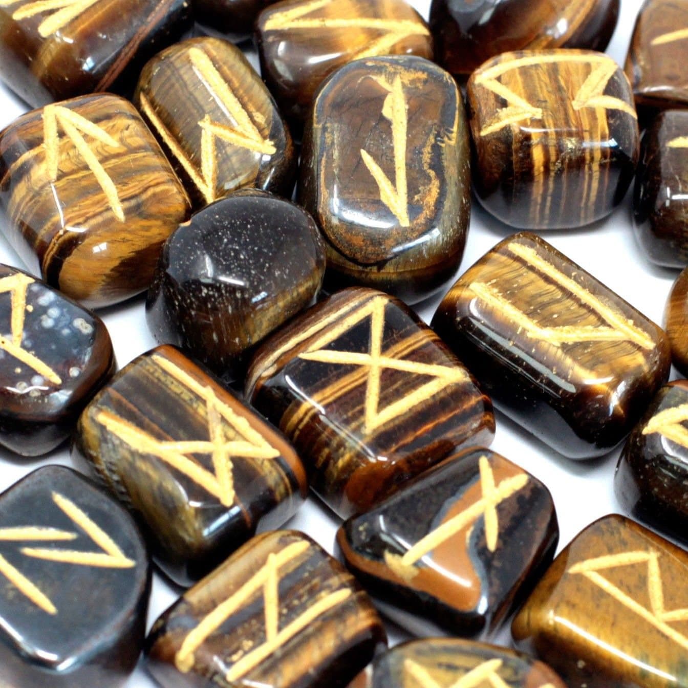 Tiger eye rune stones in a printed cotton pouch