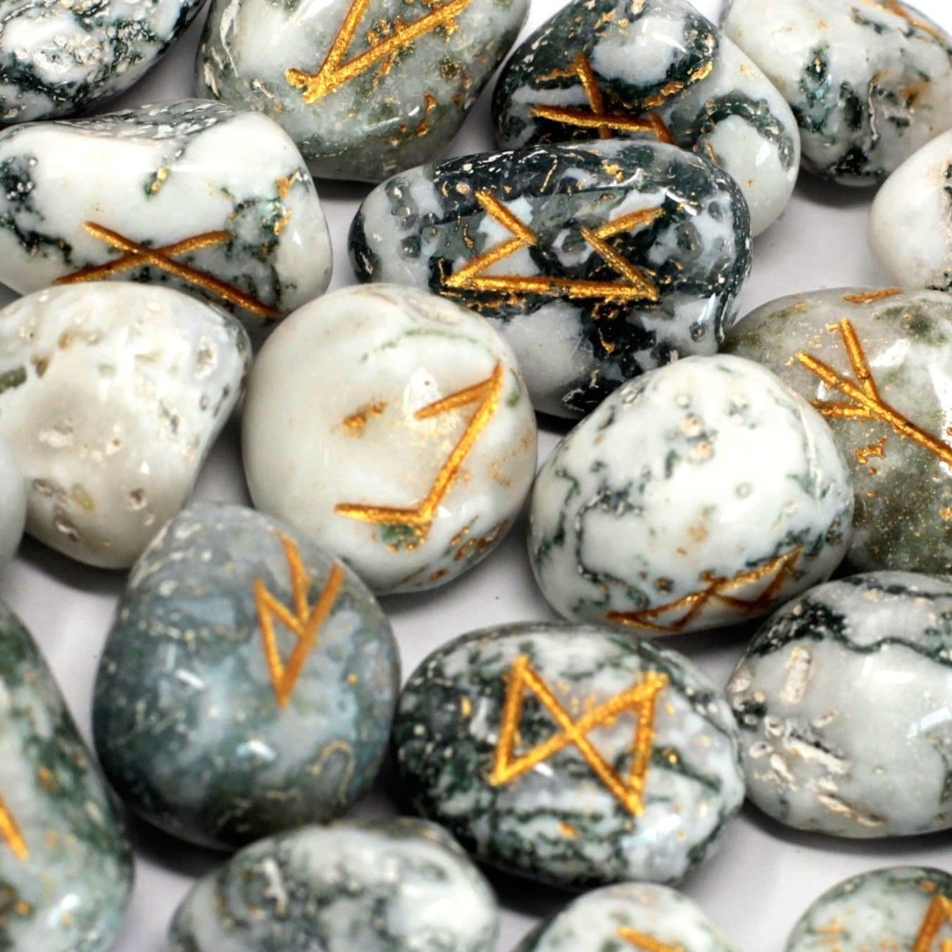 Tree agate rune stones set in a printed cotton pouch