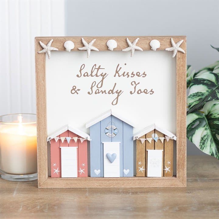 Beach hut wall plaque with pastel huts and Salty kisses text