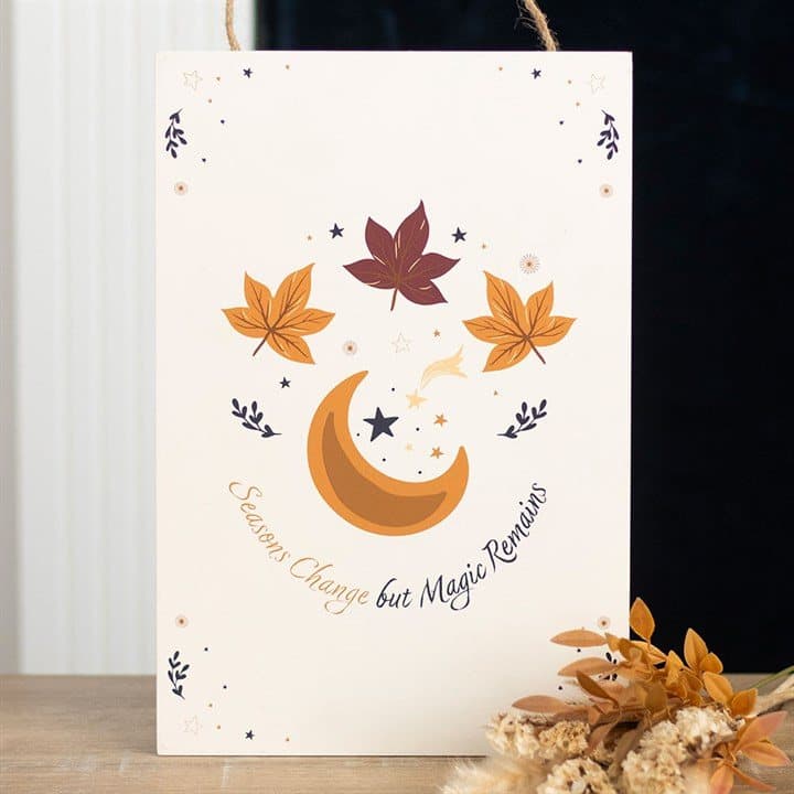 MDF autumn hanging sign reading Seasons Change but Magic Remains