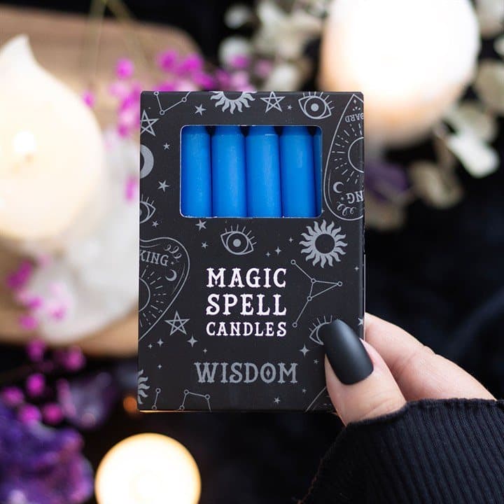 Set of 12 dark blue wisdom spell candles in a window picture box