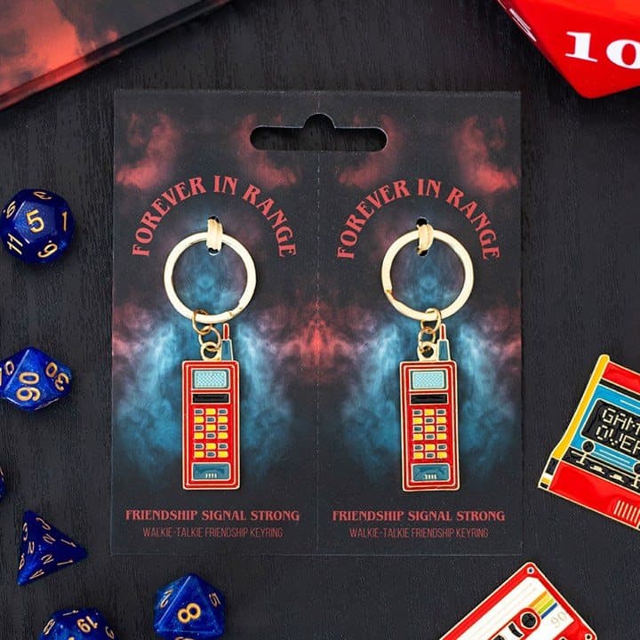 Set of two walkie talkie keyrings on a cardboard back
