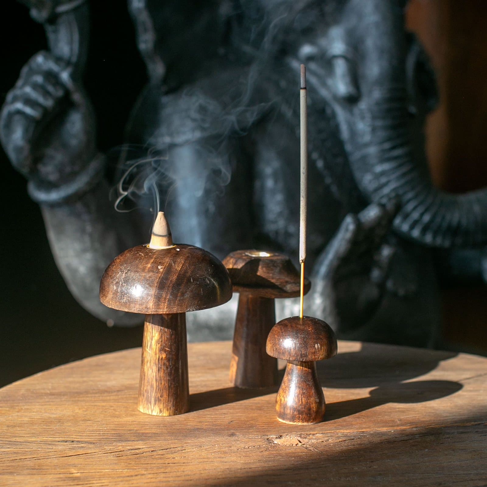 Set of three mini mango wood mushroom incense holders in different sizes
