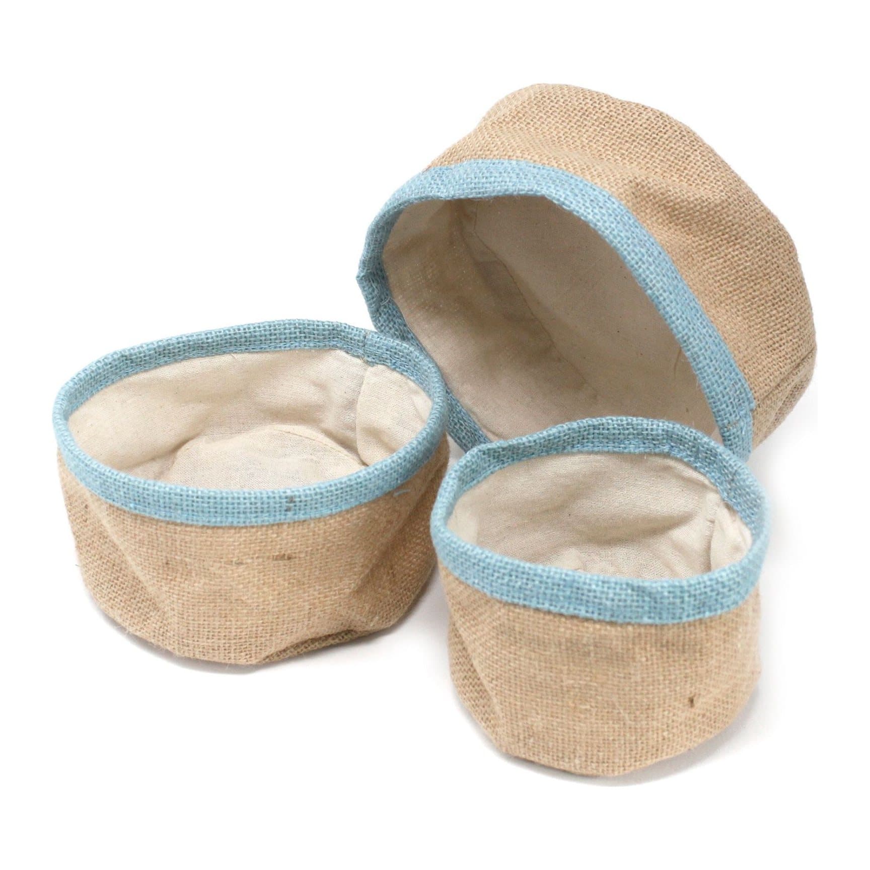 Set of three teal natural jute baskets in different sizes
