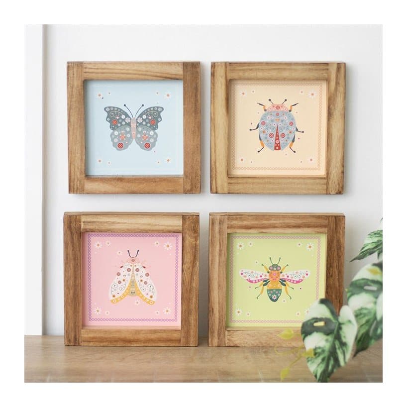 Set of four wooden-framed floral bug wall art prints in pastel colours