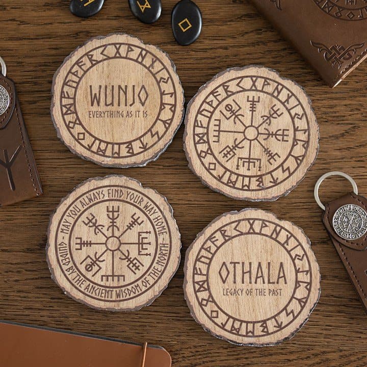Set of four wood slice coasters with Norse runes and symbols