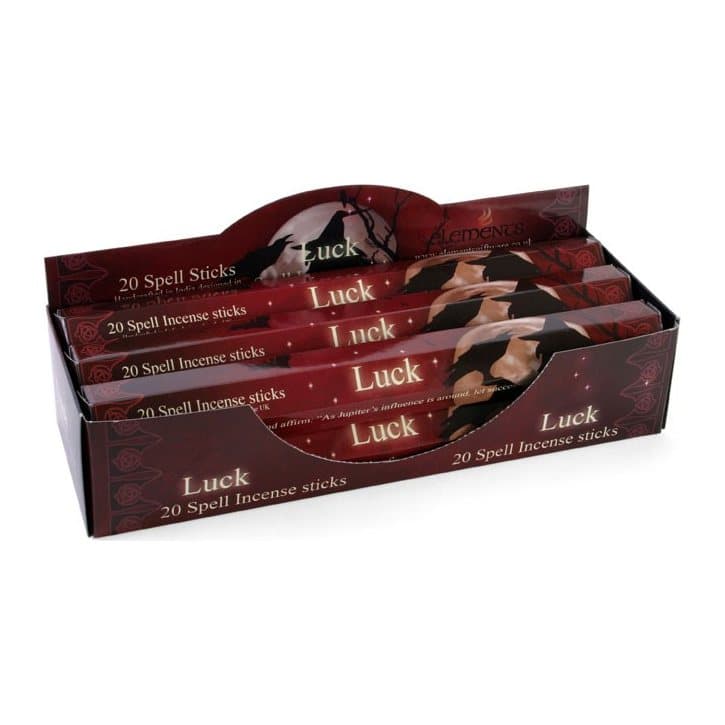 Display box of six packs of Luck Spell incense sticks by Lisa Parker