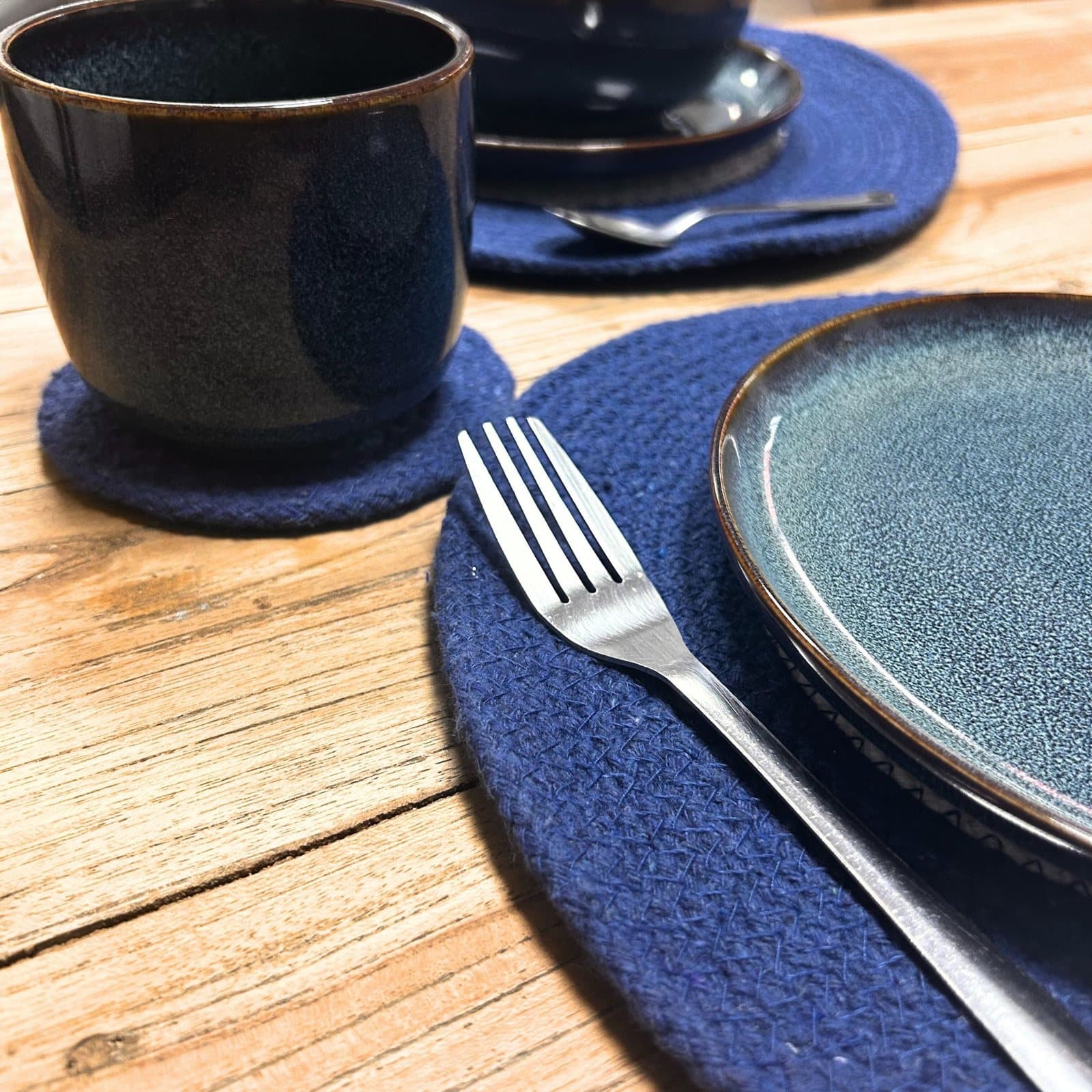 Round jute rope placemat and coaster with a concentric evil eye pattern