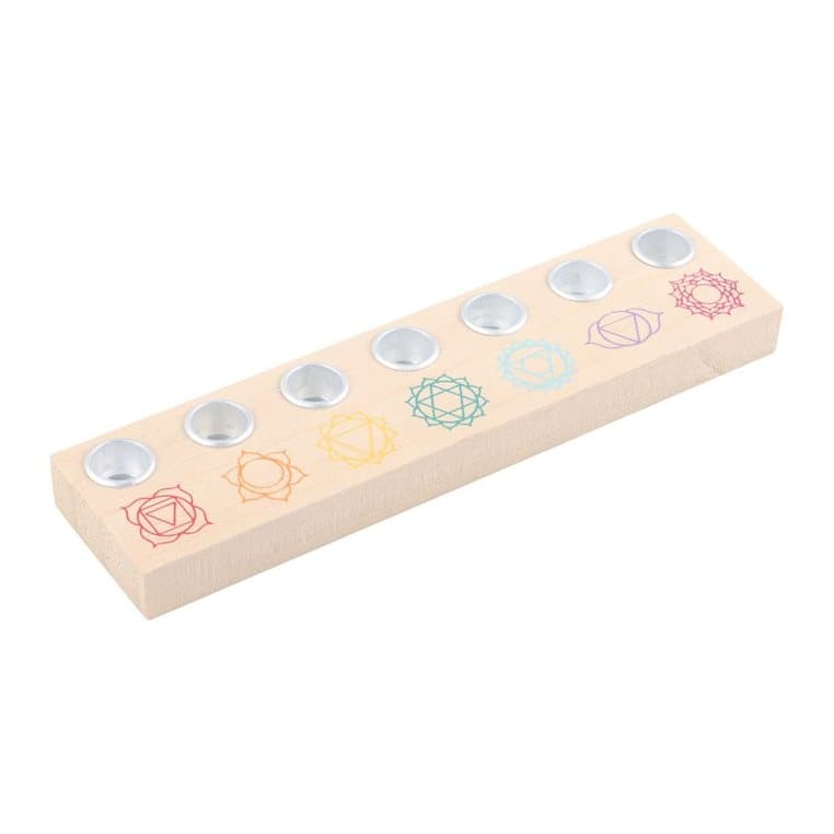 Light wood candle holder with seven small metal holders in the chakra colours