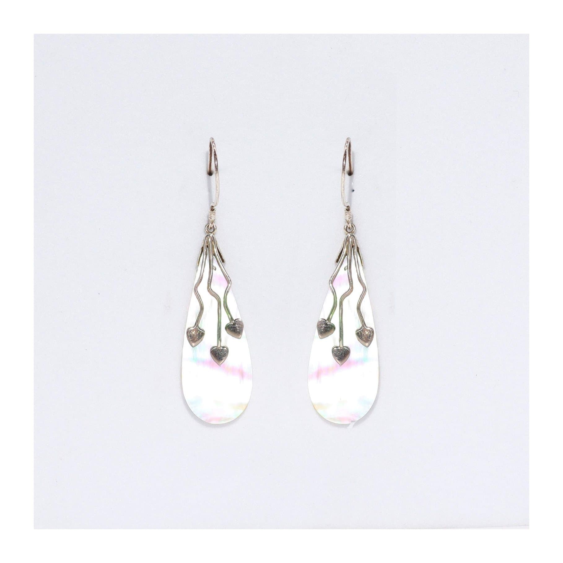 Silver and shell earrings with a three hearts design