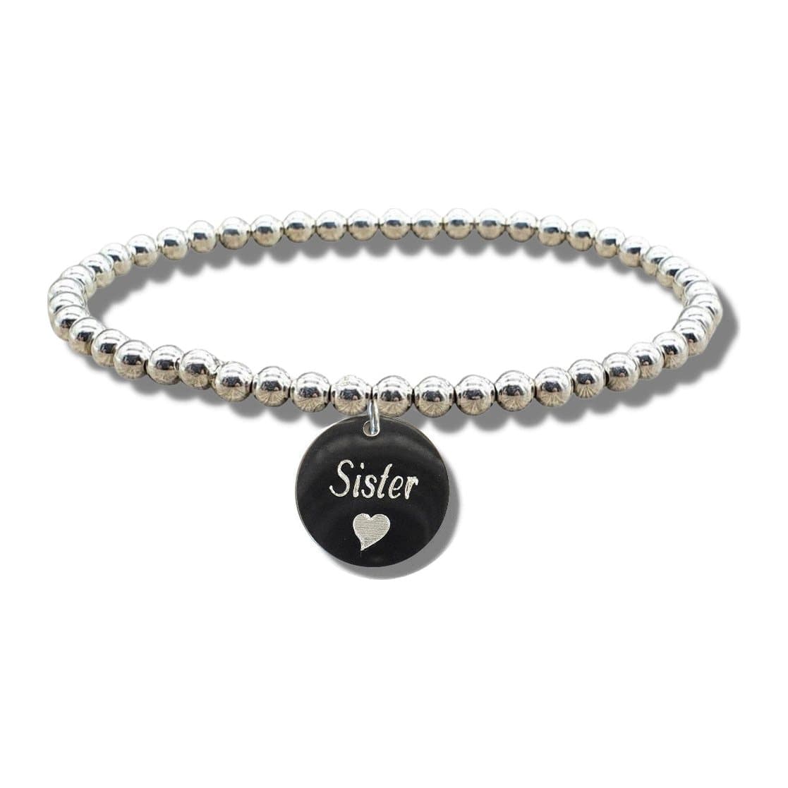 Silver beaded stretch bracelet with a round disc engraved Sister and a heart symbol