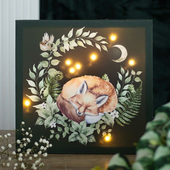 Light up canvas plaque showing a sleeping fox surrounded by forest greenery