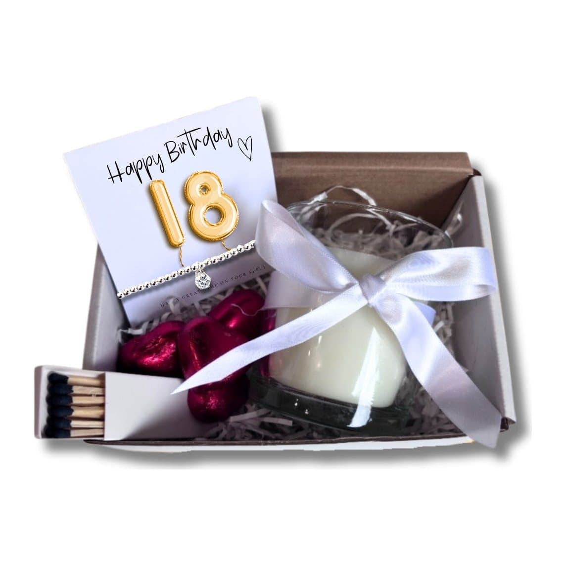 18th birthday gift hamper with a bracelet, vanilla candle and chocolate hearts