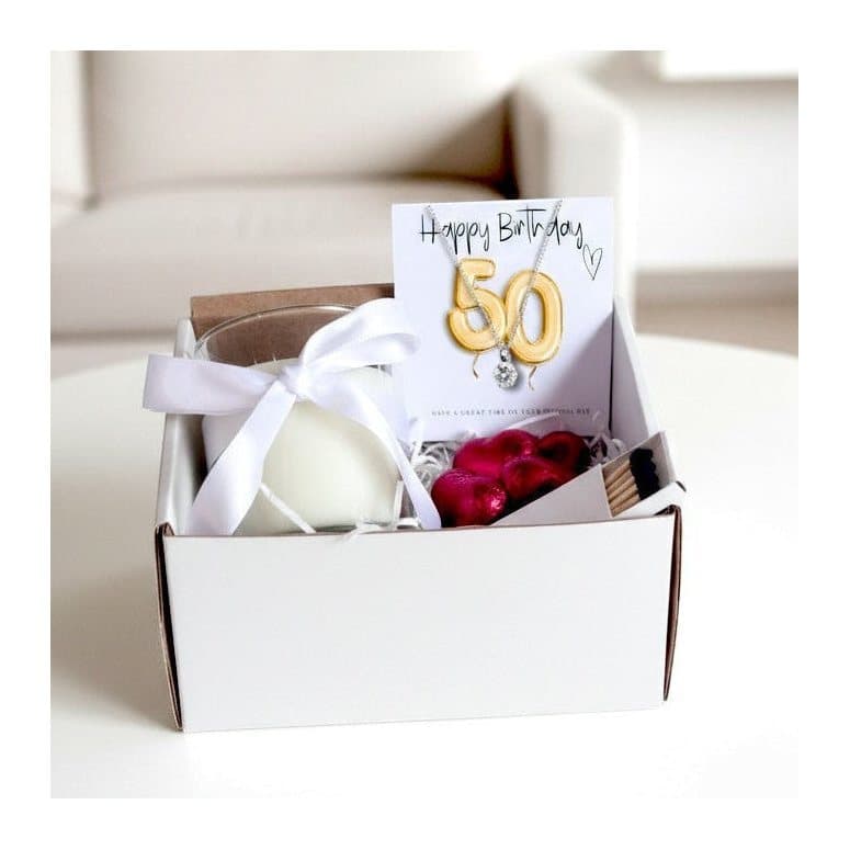 50th birthday gold balloon hamper with a necklace, candle and chocolate hearts