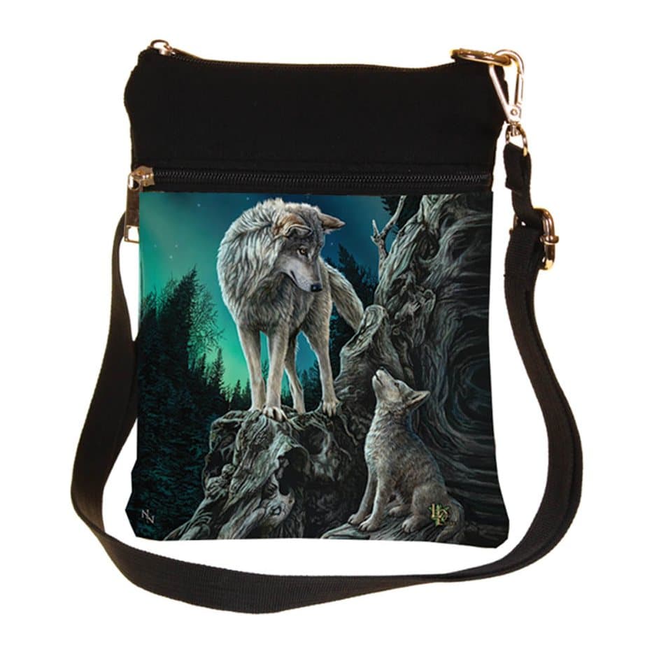 Shoulder bag with a wolf and pup on a tree root under a starlit aurora sky