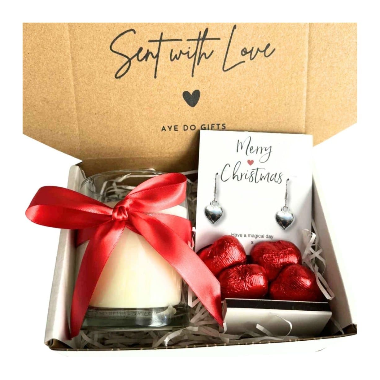 Christmas gift hamper with heart earrings, a vanilla candle and chocolate hearts