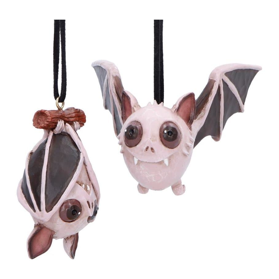 Two light purple hanging bat ornaments, one upside down and one mid-flight
